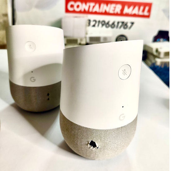 Google Home device promotional torn with original power adopter